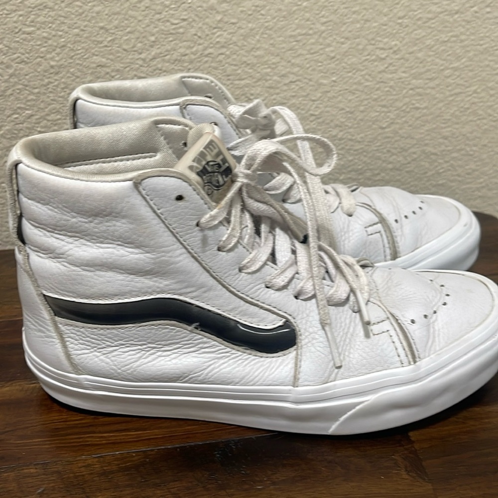 Vans White and Black High-Top Sneakers